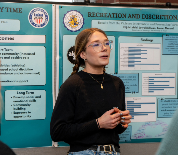 Young caucasian woman wearing glasses standing in front of research poster